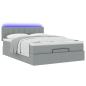 Preview: Ottoman-Bett mit Matratze & LEDs Hellgrau 140x200 cm Stoff