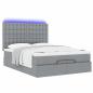 Preview: Ottoman-Bett mit Matratze & LEDs Hellgrau 140x190 cm Stoff