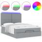 Preview: Ottoman-Bett mit Matratze & LEDs Hellgrau 140x190 cm Stoff