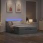 Preview: Ottoman-Bett mit Matratze & LEDs Hellgrau 140x190 cm Stoff