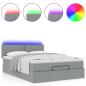 Preview: Ottoman-Bett mit Matratze & LEDs Hellgrau 140x190 cm Stoff