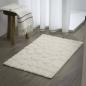 Preview: ARDEBO.de - Sealskin Badematte Pebbles Baumwolle 60x90 cm Elfenbeinfarben