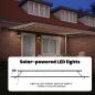 Preview: Manuelle einziehbare Markise mit LED in buntem Streifendesign 450x300 cm
