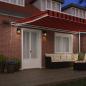 Preview: Manuelle einziehbare Markise mit LED in Orange und Braun, 500x350 cm