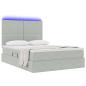Preview: Bett mit LED-Lichtleisten Hellgrau 140 x 190 cm Samt