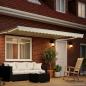 Preview: Manuelle Gelenkarmmarkise mit LEDs Creme und Weiß 4 x 3 m