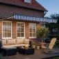 Preview: Manuelle Gelenkarmmarkise mit LEDs 3 x 2,5 m