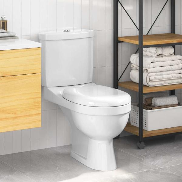 Toilette mit Spülkasten Weiß
