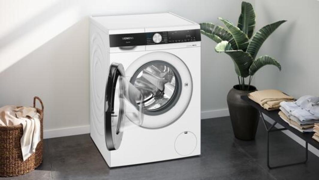 Siemens iQ500 WN44G242 Waschtrockner, 9/6 kg, 1400 U/min, smartFinish, autoDry-Technologie, speedPack L, Antiflecken-System, freistehend
