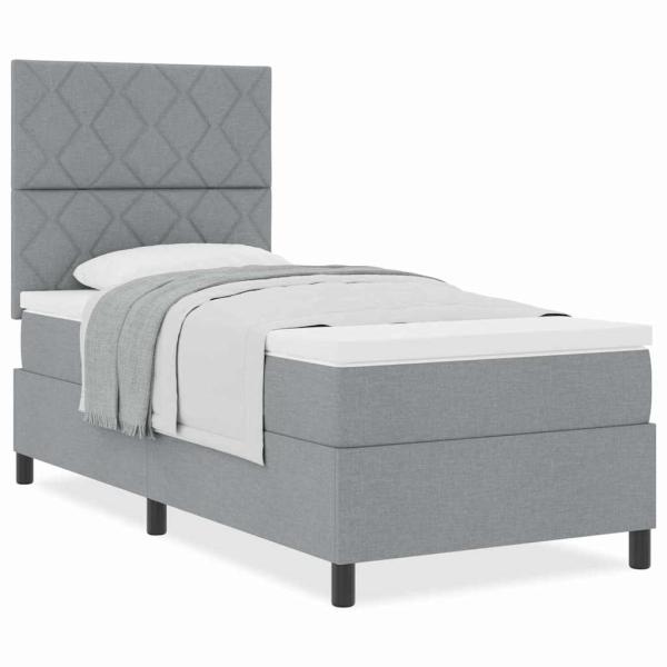 Hellgraues Boxspringbett mit Matratze 90x200 cm aus Stoff