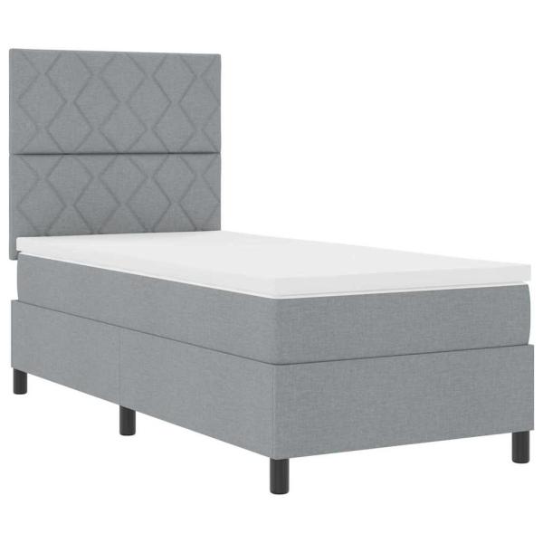 Hellgraues Boxspringbett mit Matratze 90x200 cm aus Stoff