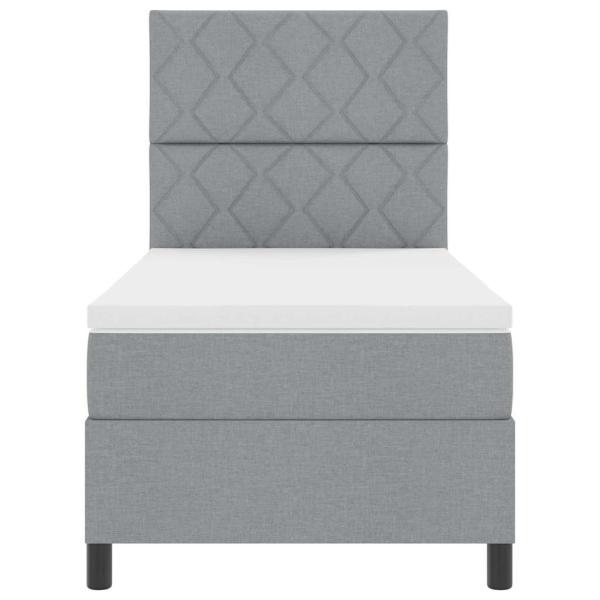 Hellgraues Boxspringbett mit Matratze 90x200 cm aus Stoff