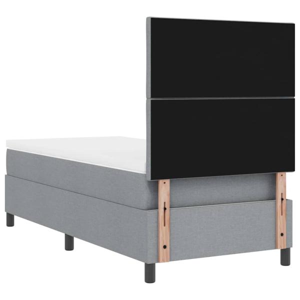 Hellgraues Boxspringbett mit Matratze 90x200 cm aus Stoff