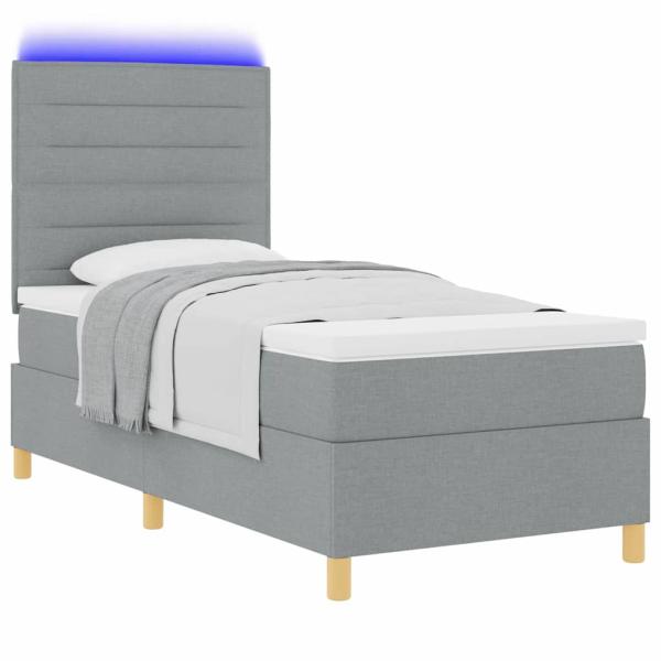 LED Boxspringbett mit Matratze Hellgrau 90x200 cm Stoff