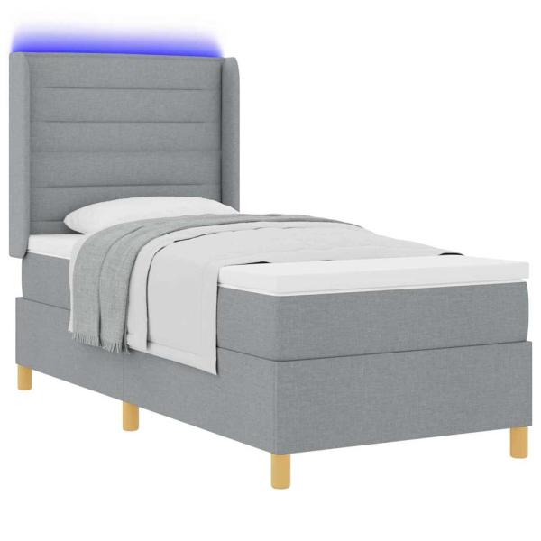 LED Boxspringbett mit Matratze Hellgrau 90x190 cm Stoff